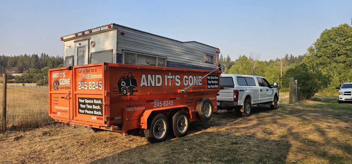 And It's Gone hauling a camper trailer at golden hour